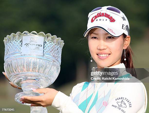 Momoko Ueda of Japan poses with the winner's trophy after winning the LPGA Mizuno Classic, at Kintetsu Kashikojima Country Club, on October 4 in Mie...