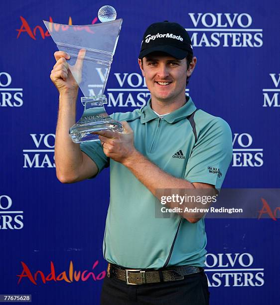 Justin Rose of England poses with the Volvo Masters trophy after winning the Order of Merit and the Volvo Masters at Valderrama Golf Club on November...