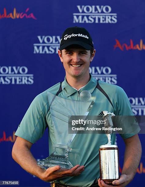 Justin Rose of England poses with the Vardon Trophy and the Volvo Masters trophy after winning the Order of Merit and the Volvo Masters at Valderrama...