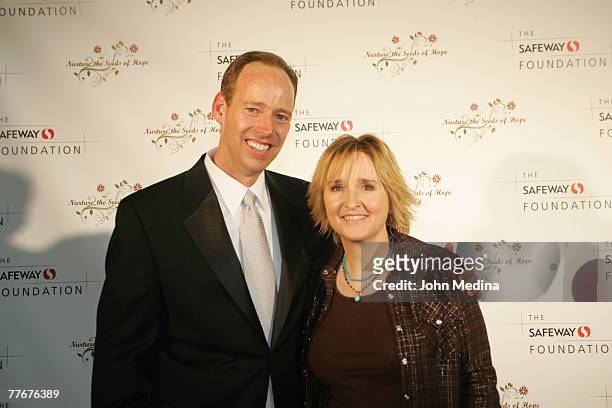 Safeway VP Kevin Herglotz poses for a photo with Melissa Etheridge during the Safeway Foundation Gala 'Nuture the Seeds of Hope' on November 3, 2007...