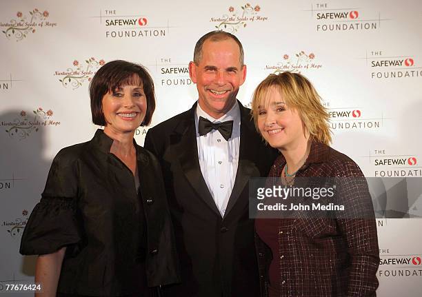 President of Blackhawk Enterprises Don Kingsborough and wife Rebecca pose for a photo with Melissa Etheridge during the Safeway Foundation Gala...