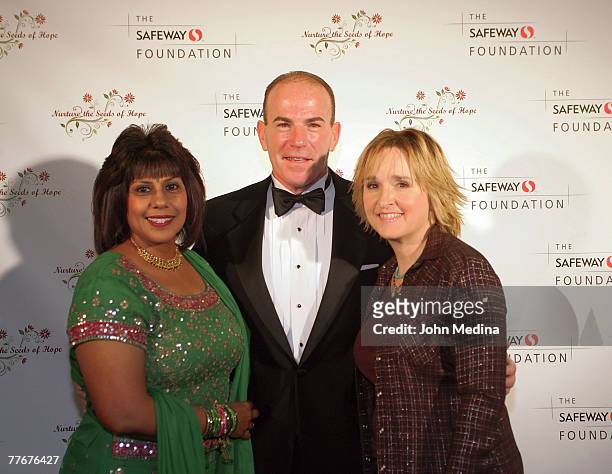 Safeway Nothern Califonia President Karl Schroeder and wife Aurelia pose for a photo with Melissa Etheridge during the Safeway Foundation Gala...