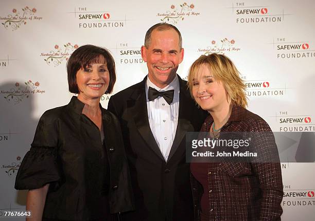 President of Blackhawk Enterprises Don Kingsborough and wife Rebecca pose for a photo with Melissa Etheridge during the Safeway Foundation Gala...