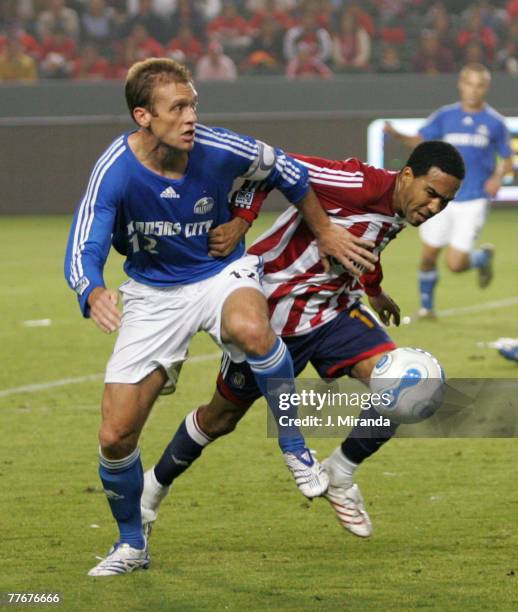 Chivas USA's Maykel Galindo in action against Kansas City Wizards Jimmy Conrad. Kansas City Wizards held on to its single-goal series lead at the...