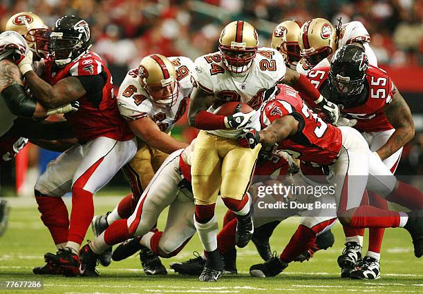 Running back Michael Robinson of the San Francisco 49ers breaks free for a long run against the Atlanta Falcons at Georgia Dome on November 4, 2007...