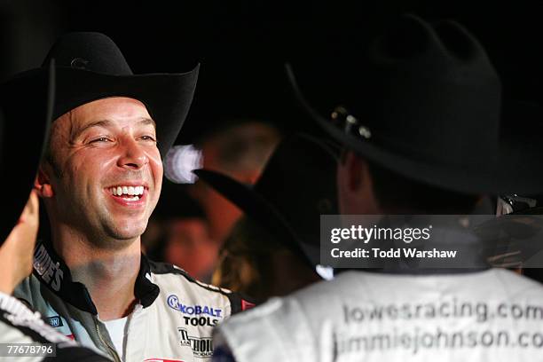 Chad Knaus, crew chief for Jimmie Johnson, driver of the Lowe's/Kobalt Chevrolet, celebrates in victory lane after winning the NASCAR Nextel Cup...