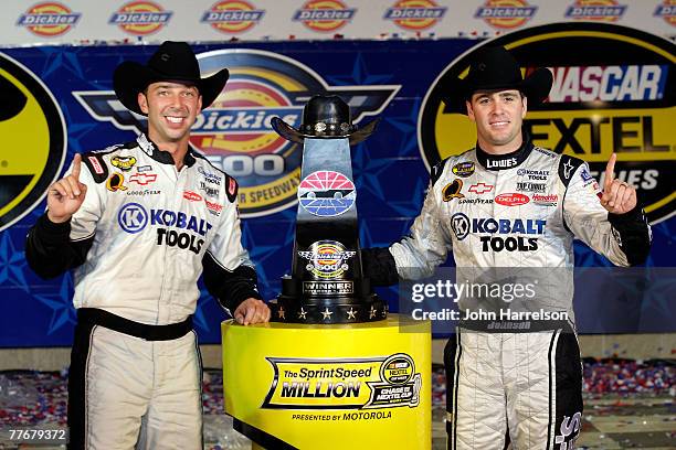 Crew chief, Chad Knaus and Jimmie Johnson, driver of the Lowe's/Kobalt Chevrolet, celebrates in victory lane after winning the NASCAR Nextel Cup...