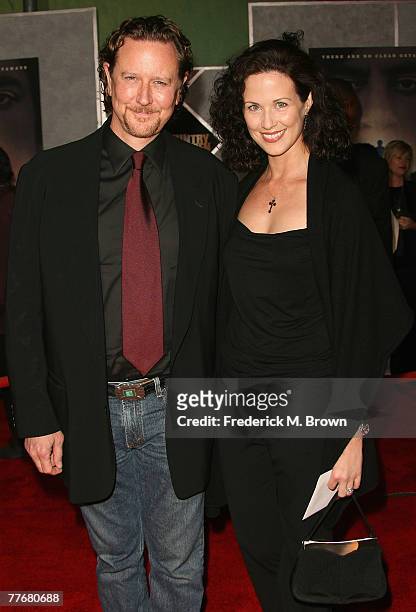 Actor Judge Reinhold and wife Amy Miller arrive at the premiere of Miramax Films' "No Country For Old Men" held at the El Capitan Theater on November...