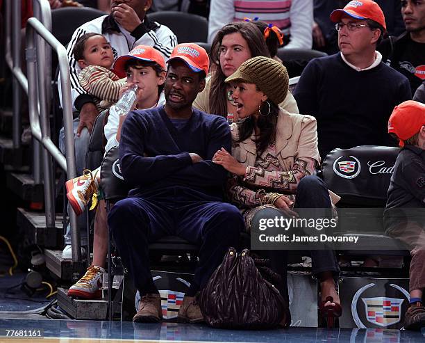 Chris Rock and Malaak Compton attend Minnesota Timberwolves vs NY Knicks basketball game at Madison Square Garden in New York City on November 4,...