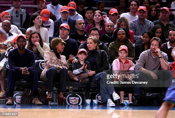 Chris Rock, Malaak Compton, T?a Leoni and David Duchovny with their children attend Minnesota Timberwolves vs NY Knicks basketball game at Madison...