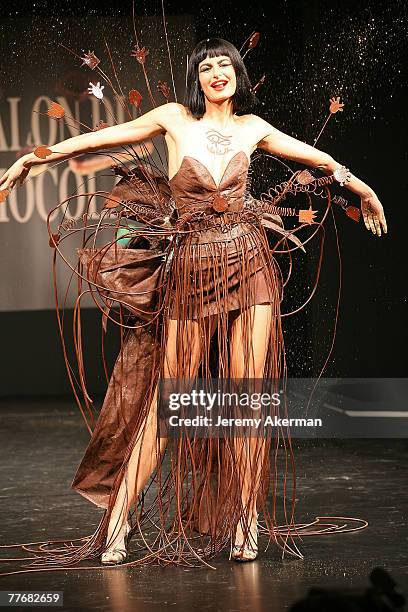 Spanish model Irene Salvador displays a chocolate decorated dress created by fashion designer Nelly Biche de Bere and chocolate maker Chocolat Weiss,...