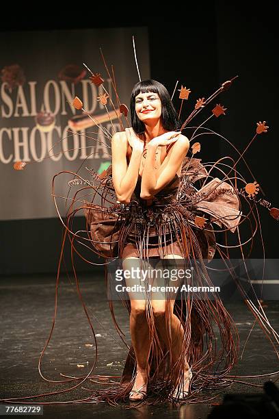 Spanish model Irene Salvador displays a chocolate decorated dress created by fashion designer Nelly Biche de Bere and chocolate maker Chocolat Weiss,...