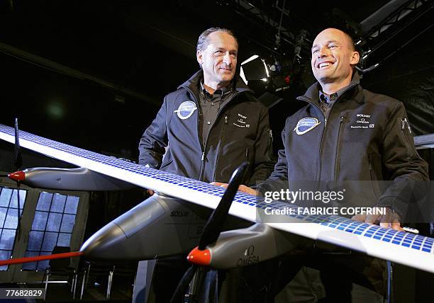 Solar Impulse CEO Andre Borschberg and Swiss scientist-adventurer and pilot Bertrand Piccard pose 05 November 2007 in Duebendorf, during a press...