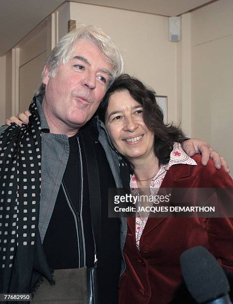 French writer Gilles Leroy and book publisher Isabelle Gallimard pose, 05 November 2007 in Paris after Leroy received the 2007 French literature...