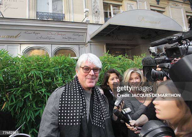 French writer Gilles Leroy speaks to the press, 05 November 2007 in Paris after he received the 2007 French literature prize Prix Goncourt. France's...