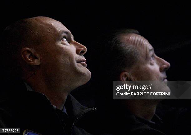 Swiss scientist-adventurer and pilot Bertrand Piccard watches a film presentation with Solar Impulse CEO, pilot Andre Borschberg 05 November 2007 in...