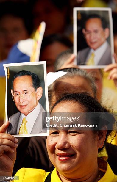 Thai people hold The picture of King Bhumibol Adulyadej at Wat Arun during the Royal celebrations on November 5 in Bangkok, Thailand. Thailand's...