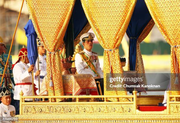 Thai Crown Prince Vajiralongkorn sits on the Royal Barge on the Chao Phraya river during the Royal celebrations on November 5 in Bangkok, Thailand....