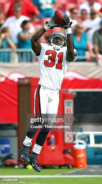 Safety Phillip Buchanon of the Tampa Bay Buccaneers catches a pass during warmups before a game against the Jacksonville Jaguars at Raymond James...