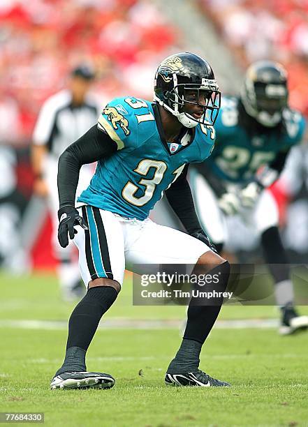 Cornerback Aaron Glenn of the Jacksonville Jaguars defends in a game against the Tampa Bay Buccaneers at Raymond James Stadium on October 28, 2007 in...