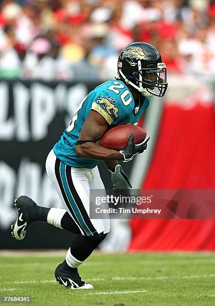 Cornerback Scott Starks of the Jacksonville Jaguars runs down field in a game against the Tampa Bay Buccaneers at Raymond James Stadium on October...