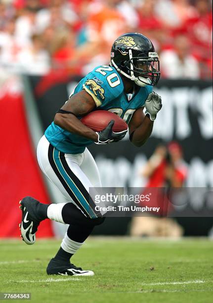 Cornerback Scott Starks of the Jacksonville Jaguars runs down field in a game against the Tampa Bay Buccaneers at Raymond James Stadium on October...