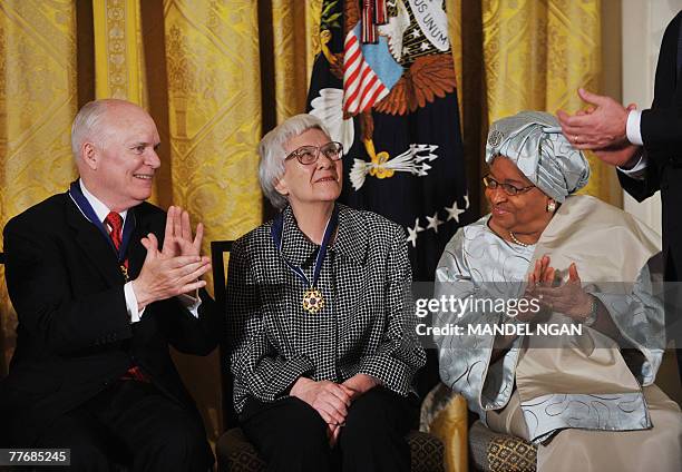 "To Kill A Mockingbird" novelist Harper Lee receives applause from groundbreaking television executive Brian Lamb , Liberian President Ellen...