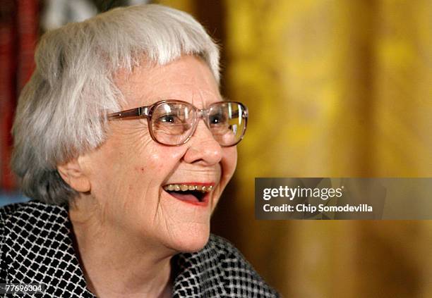 Pulitzer Prize winner and "To Kill A Mockingbird" author Harper Lee smiles before receiving the 2007 Presidential Medal of Freedom in the East Room...