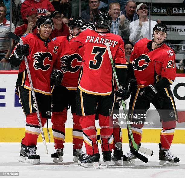 Dion Phaneuf of the Calgary Flames and teammates celebrate after the victory against the Nashville Predators on October 30, 2007 at the Pengrowth...