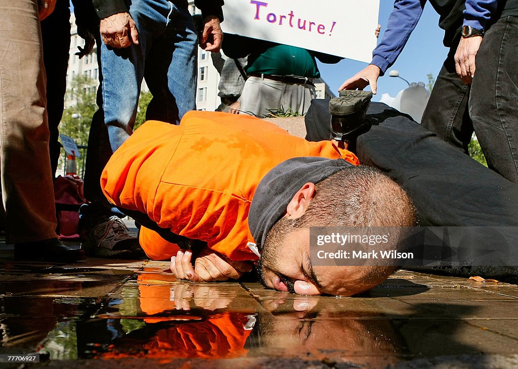 Anti-Mukasey Protestors Hold Demonstration Of "Waterboarding"