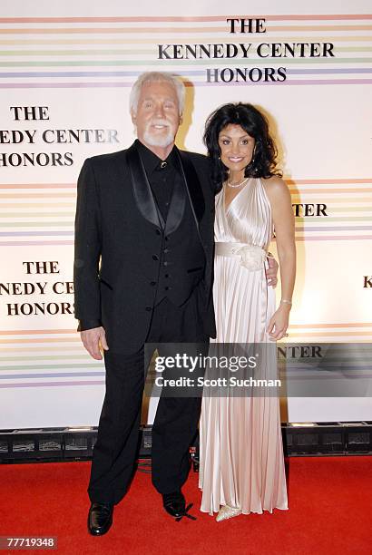 Kenny Rogers and his wife Wanda arrive at the 2006 Kennedy Center Honors Sunday night in Washington DC. The 29th Annual Kennedy Centers Honors will...