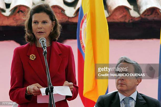 Colombian President Alvaro Uribe listens to Queen Silvia of Sweden during the opening ceremony of a biodiesel plant's foundation stone 05 November...