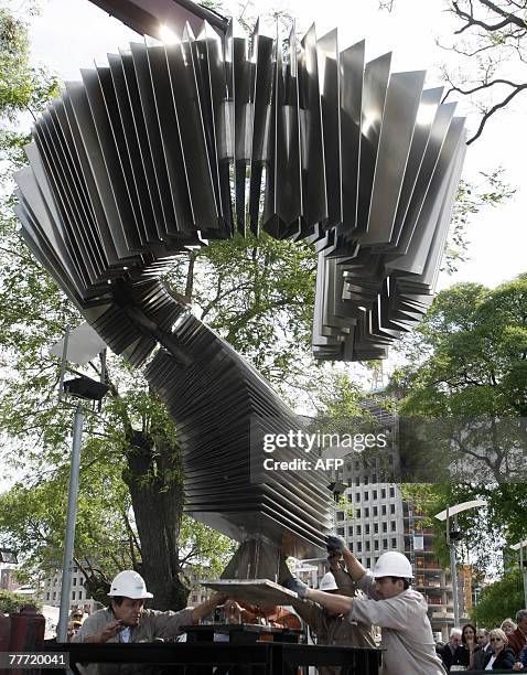 Workers install in Buenos Aires on November 5th the first monument dedicated to Tango in the world. The 2-ton and 5-metre-tall metallic structure...