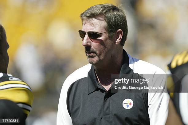 Linebackers coach Keith Butler of the Pittsburgh Steelers talks with a player on the sideline before a game against the San Francisco 49ers at Heinz...