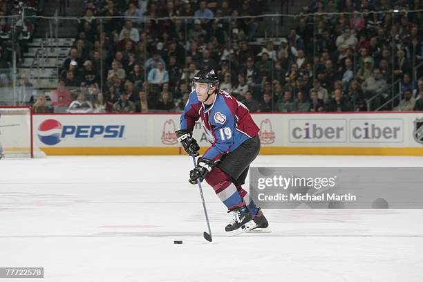 Joe Sakic of the Colorado Avalanche skates with the puck against the Pittsburgh Penguins at the Pepsi Center on November 1, 2007 in Denver, Colorado....