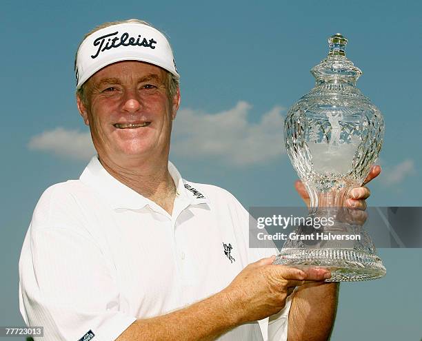 Mark Wiebe holds the trophy after winning the Champions Tour SAS Championship at Prestonwood Country Club September 23, 2007 in Cary, North Carolina.