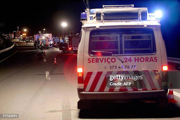 Rescue vehicles line up 05 November 2007 on Highway A-23 in Vila Velha do Rodao, central Portugal after a bus carrying 38 elderly people and a car...