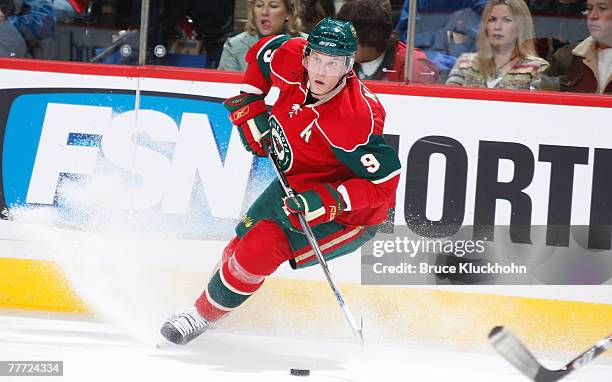 Mikko Koivu of the Minnesota Wild handles the puck against the Edmonton Oilers during the game at Xcel Energy Center November 5, 2007 in Saint Paul,...