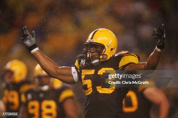 Clark Haggans of the Pittsburgh Steelers pumps the crowd up in the rain against the Baltimore Ravens on November 5, 2007 at Heinz Field in...