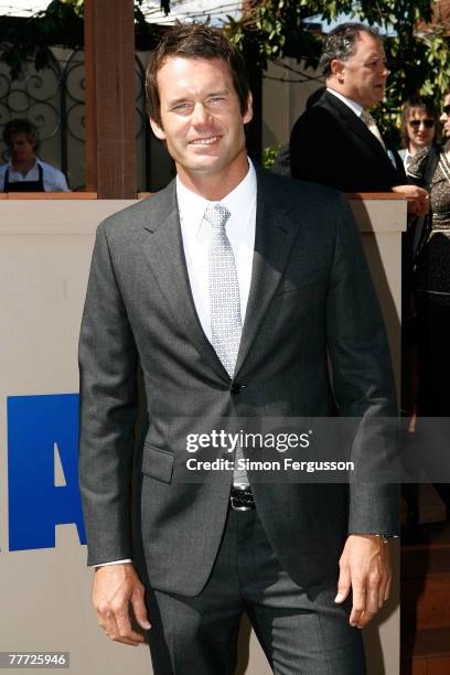 Presenter Tom Williams poses outside the Lavazza marquee on the second day of the Melbourne Cup Carnival 2007, Melbourne Cup Day, at Flemington Race...