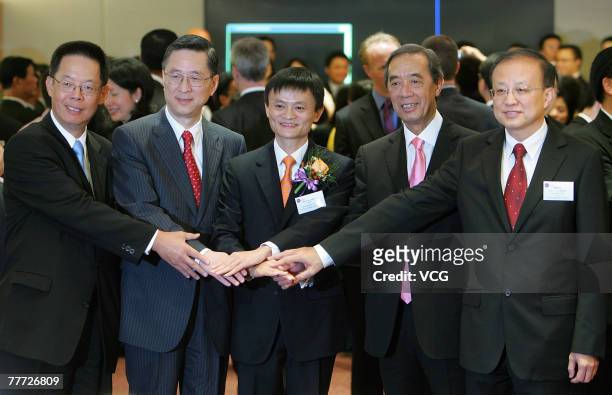 Ma Yun , founder and chief operating officer of China's Alibaba.com celebrates at the listing ceremony at the Hong Kong Stock Exchange November 6,...