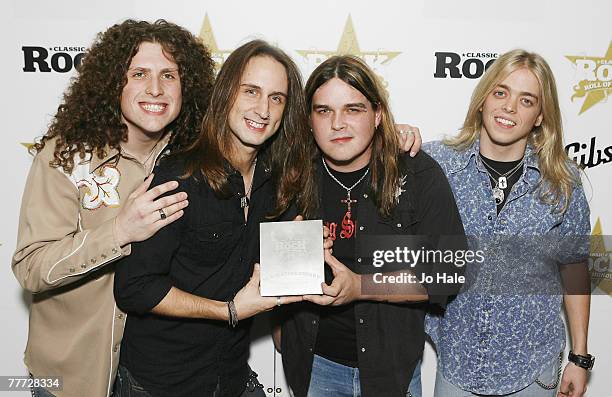 Chris Robertson, Ben Wells, Jon Lawhon and John Fred Young of Black Stone Cherry pose with their award for Best New Band during the third annual...