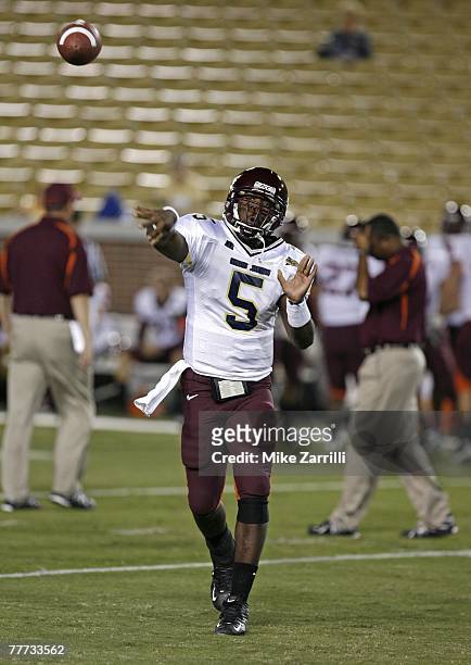 Quarterback Tyrod Taylor of the Virginia Tech Hokies throws a pass during pre-game warmup drills before the game against the Georgia Tech Yellow...