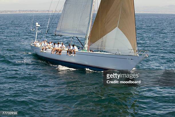 sailing crew on sailing boat - sailing competition stock pictures, royalty-free photos & images