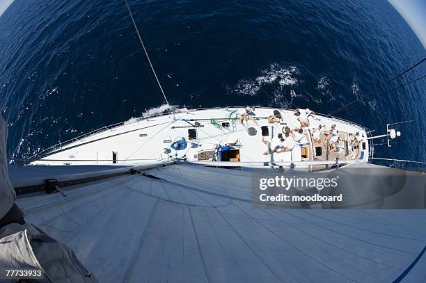 view of sailboat during race from mast - yachting race stock pictures, royalty-free photos & images