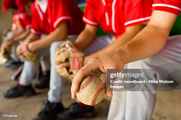 players in dugout - dugout baseball stock pictures, royalty-free photos & images