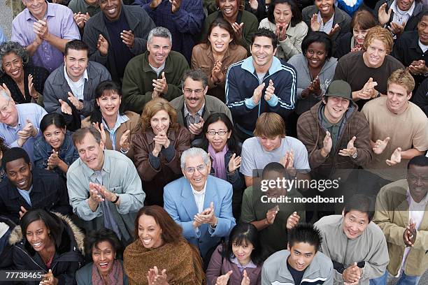 applauding crowd at rally - crowd looking up stock pictures, royalty-free photos & images