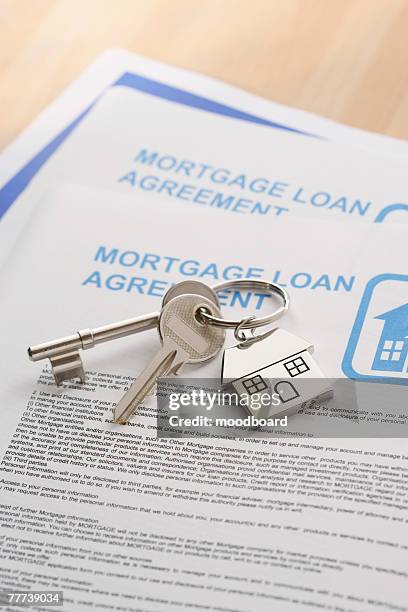 keys to a new home - mortgage document stock pictures, royalty-free photos & images