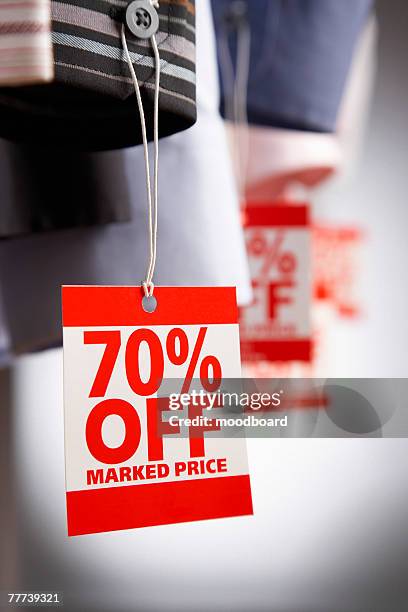 clothing on sale - shirt tag stock pictures, royalty-free photos & images