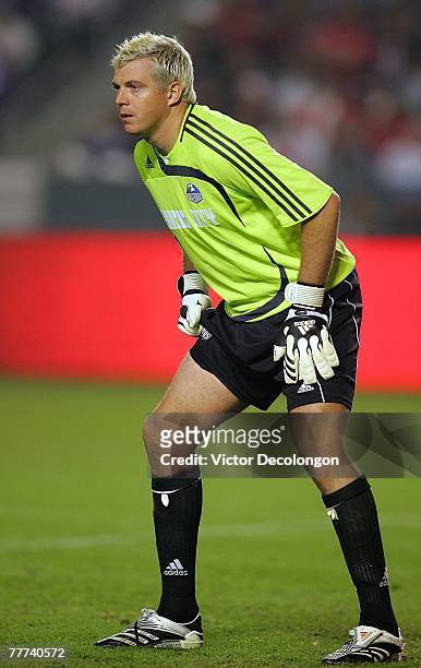 Goalkeeper Kevin Hartman of the Kansas City Wizards stands in position to defend his net in the second half of their Western Conference playoff game...